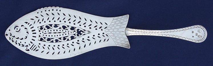 Fish-shaped server has geometric open-work design that includes zodiac fish signs in the center - Norwegian Metalworking