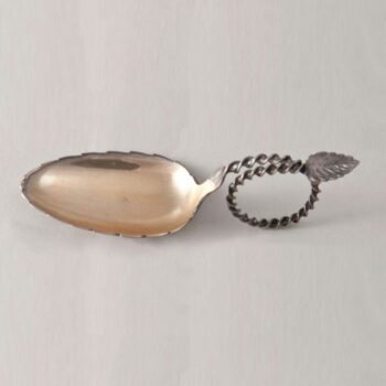 Sugar spoon with a large oval bowl with serrated edges and a gold wash - Norwegian Metalworking