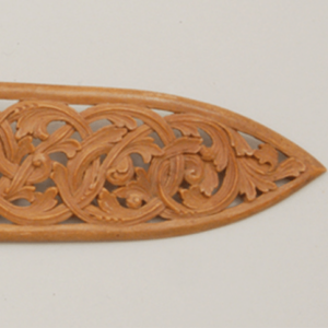 Hand carved wooden spoon with handle with open acanthus carving feature image - Decorative Woodcarving