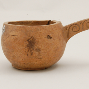 dipper with spiral carved design on side of handle feature image- decorative woodcarving