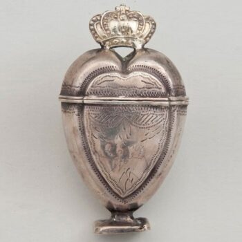 Perfume bottle in a long heart shape with a crown on top, square crop - Norwegian Metalworking