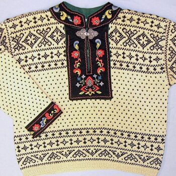 knit pullover sweater has the lice pattern and other traditional geometric Norwegian patterns in bands across the shoulders and waist - Textiles
