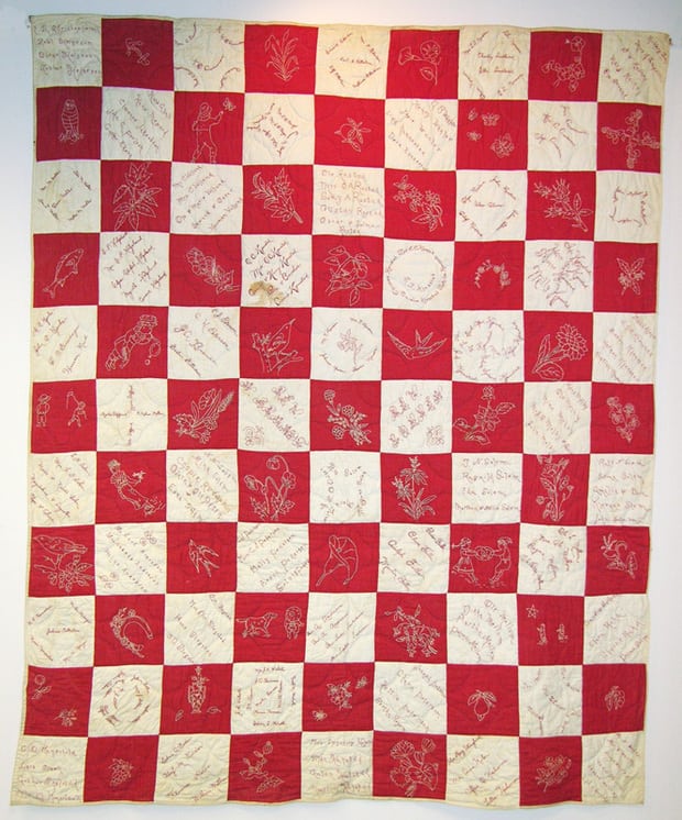 This friendship quilt is made of solid red and white square blocks assembled in a checkerboard fashion - Textiles