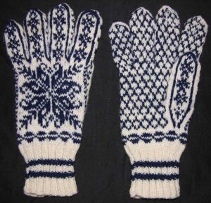 hand-knit gloves are made of heavy wool in dark blue and white - Textiles