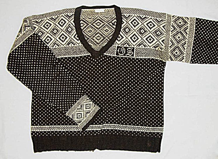 Brown and white knit sweater with a lice pattern across the torso - Textiles