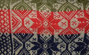 Coverlet with change of colors of center squares is hand inlay - Textiles