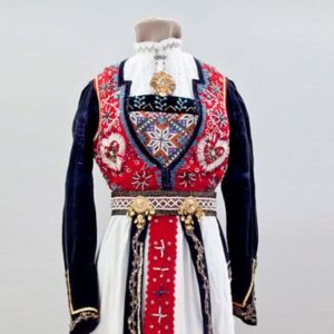 Dress with decorated with gold metallic lace and extensive bead work in blue, black, clear, and gold beads - Textiles