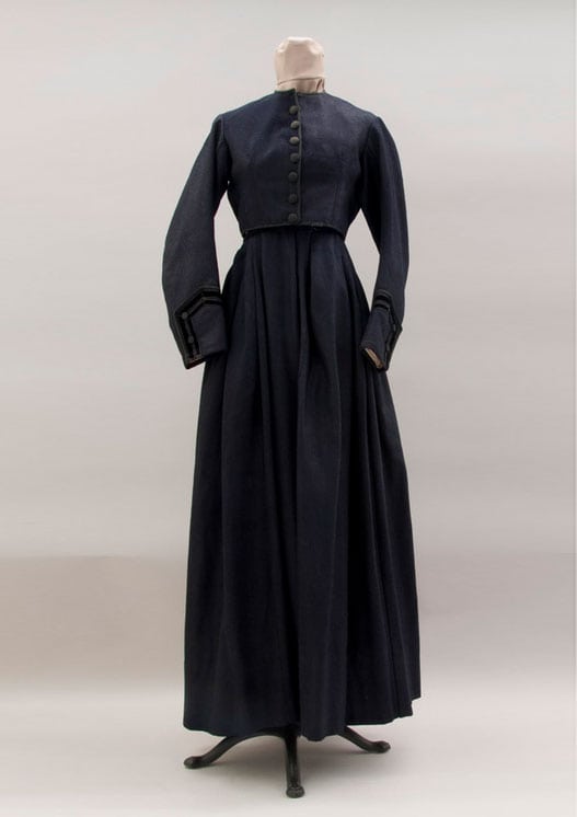 Ankle length dress with hand finishing is made of a very dark blue closely woven wool - Textiles