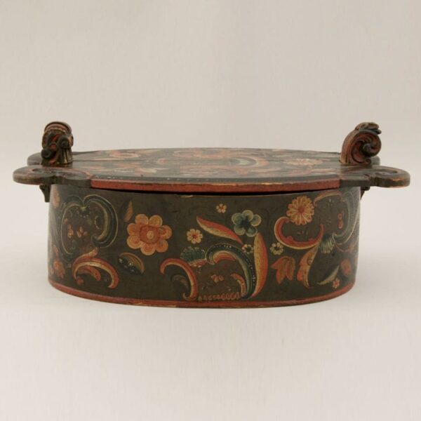 Bentwood box with pegged base - cover held by decoratively carved wood extensions - Rosemaling