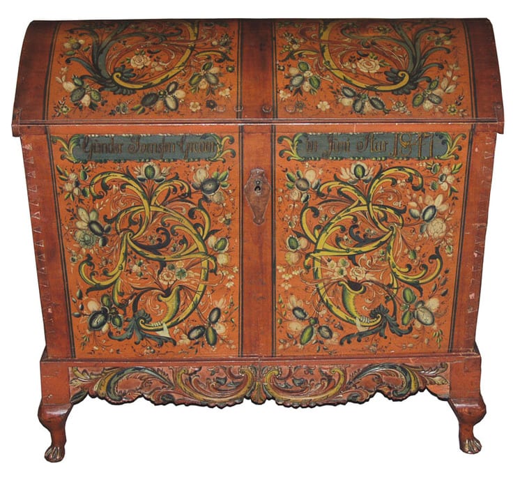 Trunk has dovetailed corner construction with iron reinforcements at the corners and diamond shape escutcheon - Rosemaling